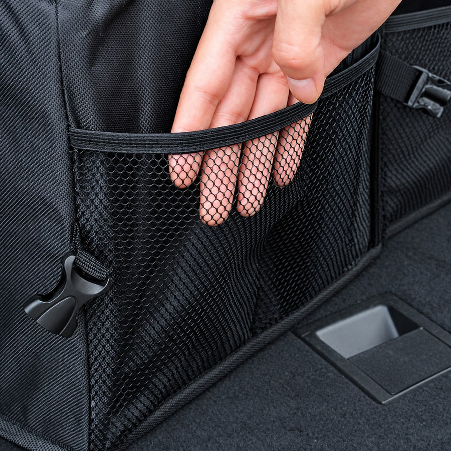 Bottles go in the outside pockets.